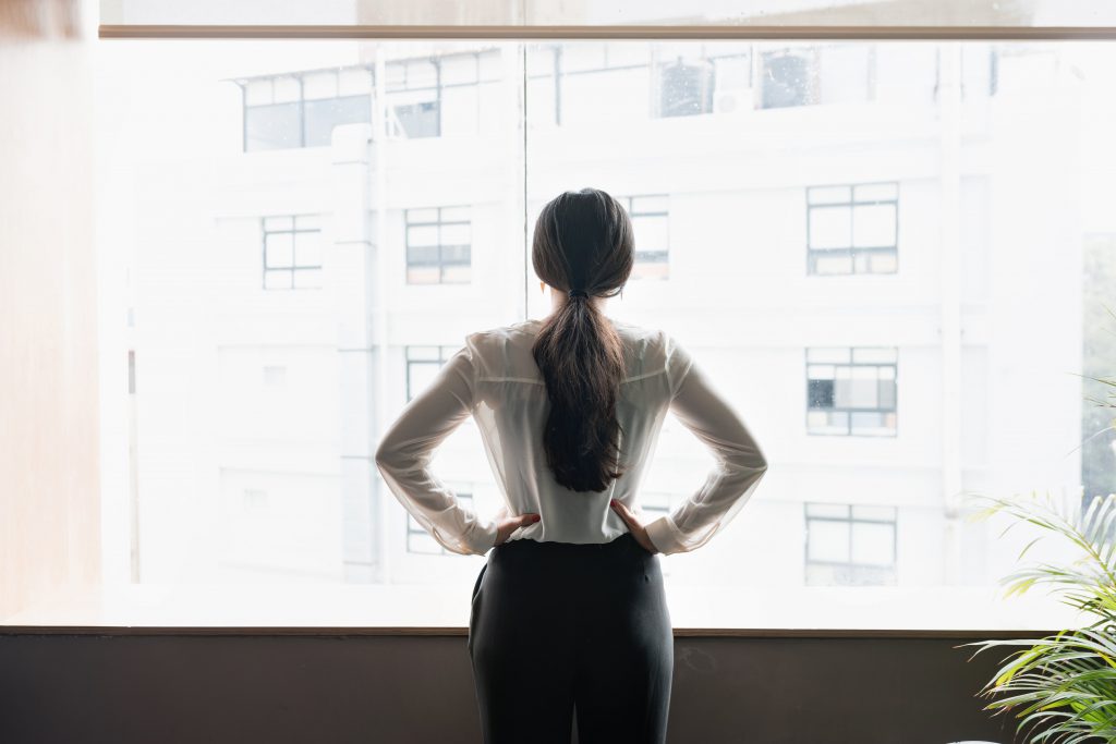 young-woman-taking-stock-of-her-surroundings young-woman-taking-stock-of-her-surroundings