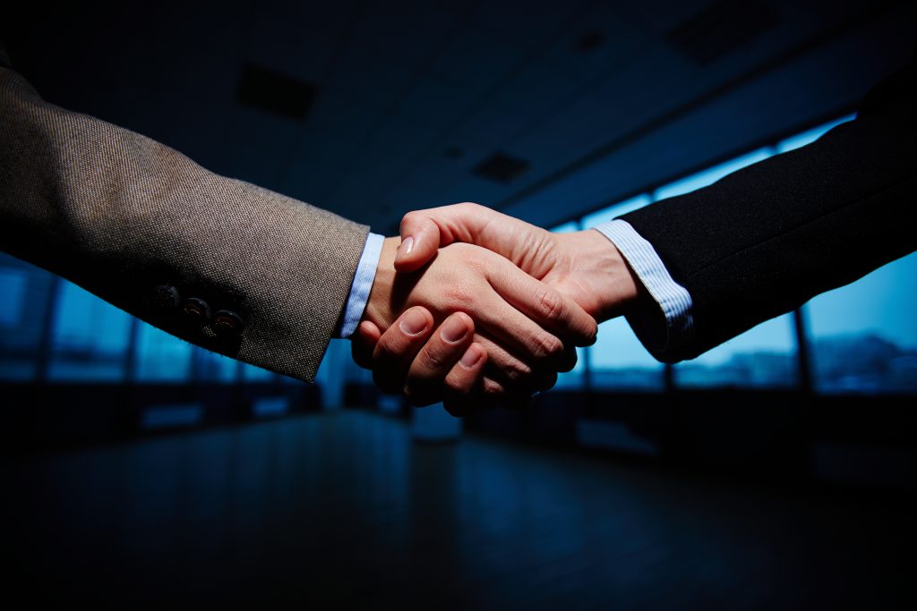 Handshaking Handshake of business partners
